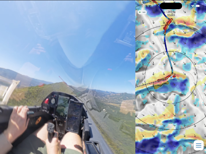 A glider flying along a ridge beside the SkySight Inflight forecast on a phone